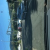 Northbound cars cut the corner of Railway Lane & Redman Avenue, Thirroul.