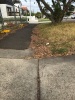 Uneven, poorly laid bitumen footpath